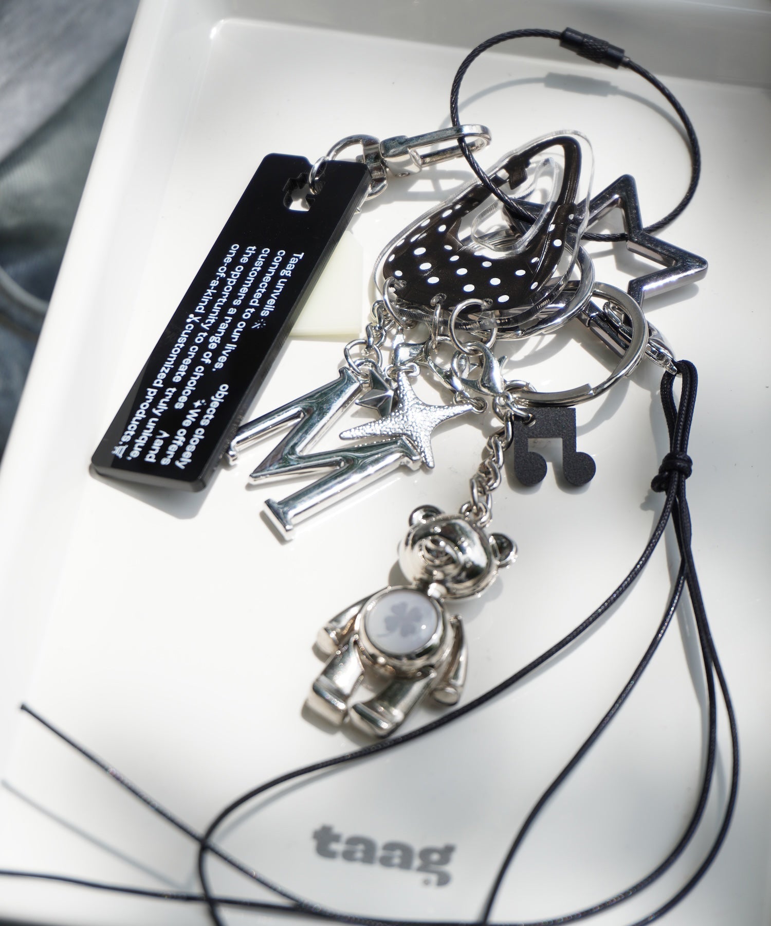 graphics charm holder_bag_black-1